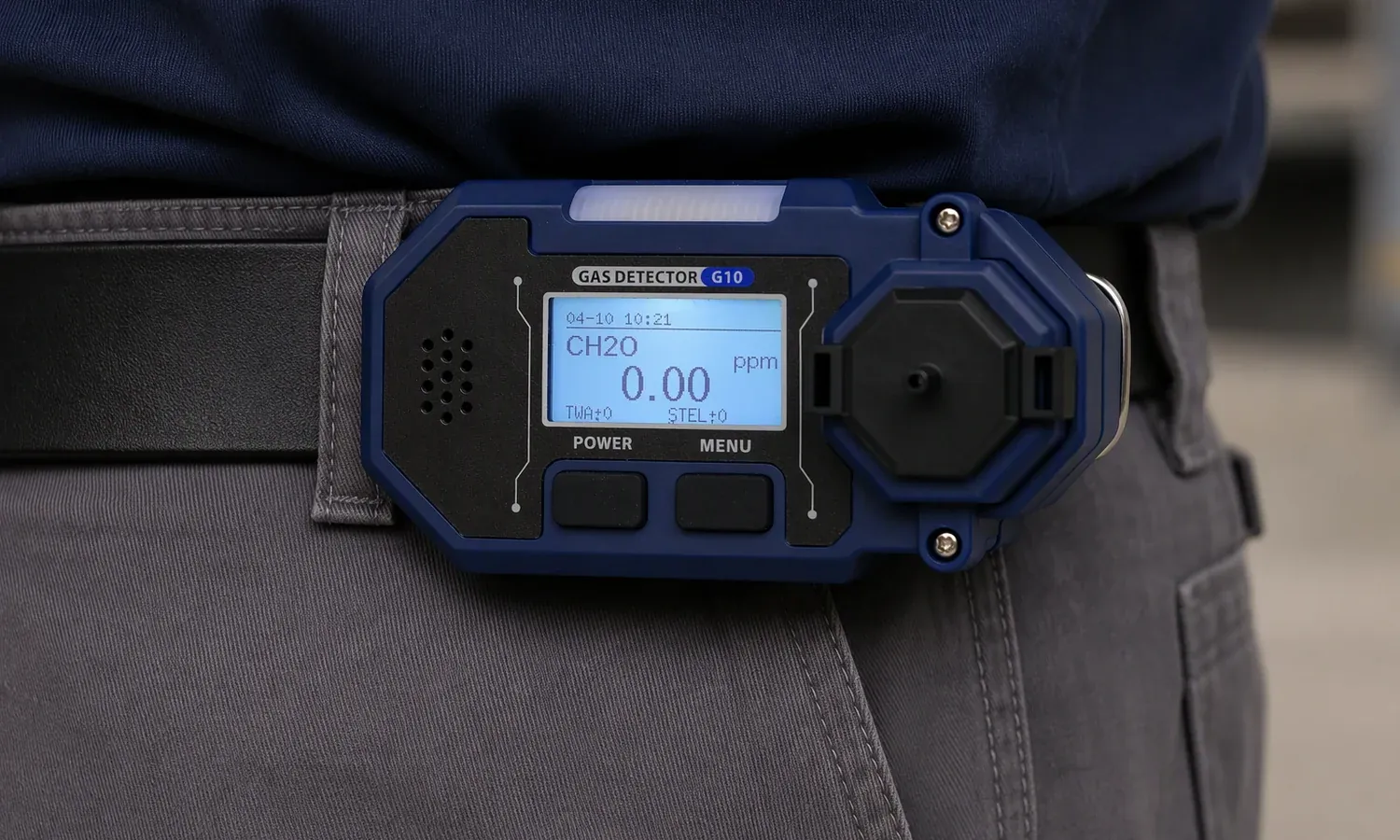Portable formaldehyde detector clipped on a worker belt at the waist
